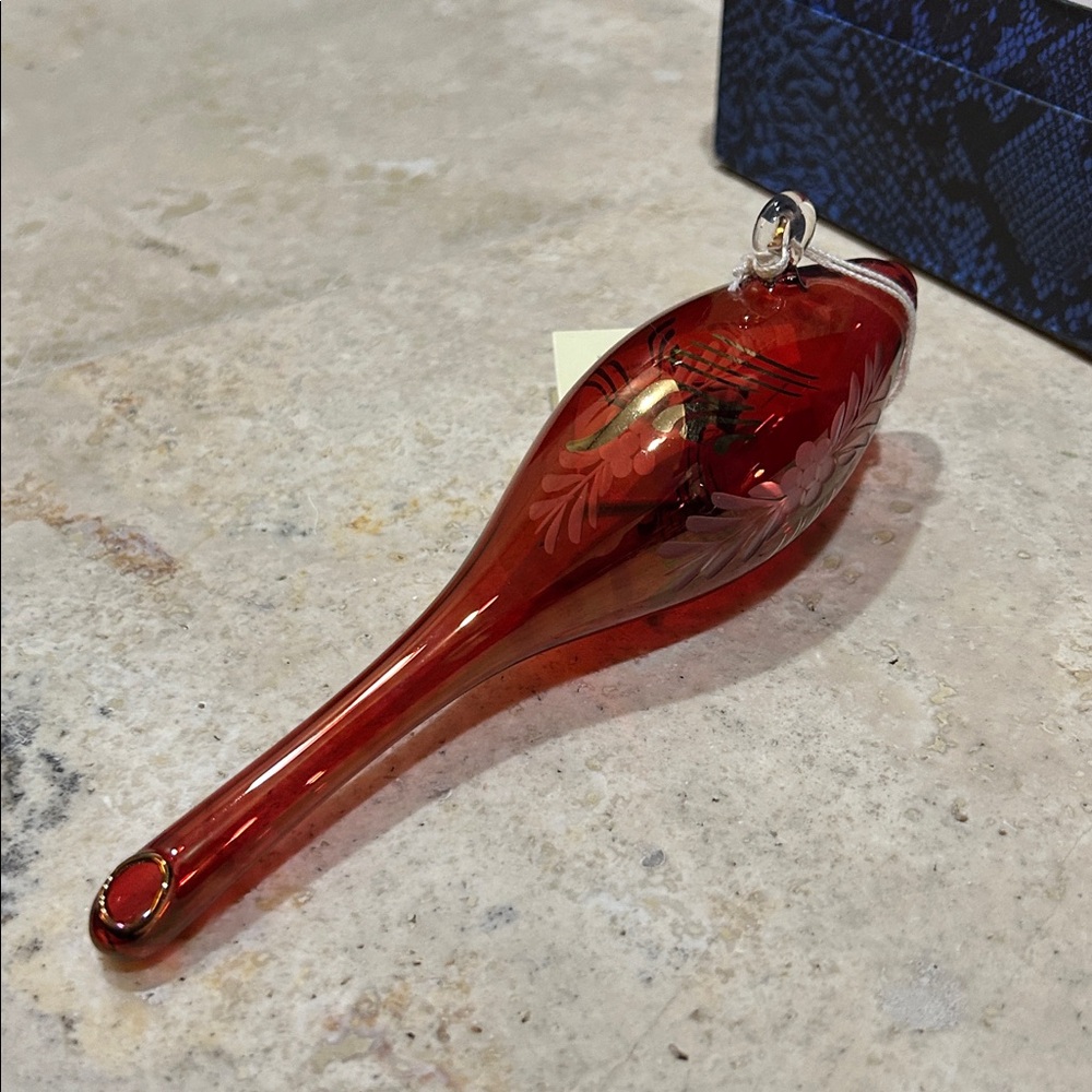 EGYPTIAN MUSEUM glass ornament featuring a red and amber (Amberina)
